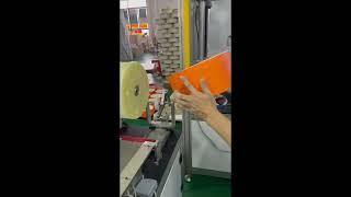 Wrapping machine for cylindrical boxes