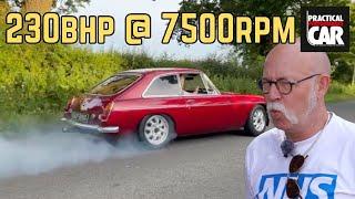 Standard MGB GT? Far from it. Rebuilt bike throttle bodied classic gets thrashed - properly