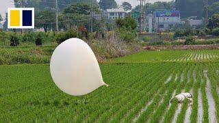 North Korean trash balloons flying into South seen at border