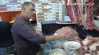 Iraqi food making kebabs from lamb in the streets of Iraq