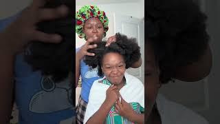 Milan Hair treatment day Using aloe Vera to detangle her hair before washing