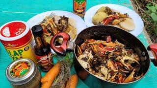 COOKING TASTY BROWN STEW BLACK CRABS