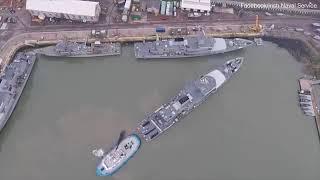 Aerial Drone Footage of Tugboat Mooring a WarShip