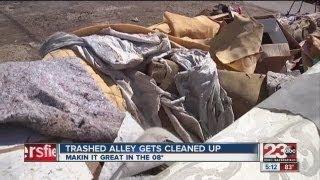 Trashed alley gets cleanup