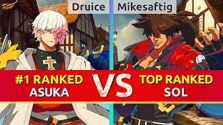 GGST ▰ Druice (#1 Ranked Asuka) vs Mikesaftig (TOP Ranked Sol). High Level Gameplay