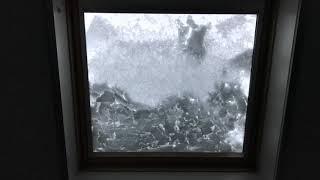 Snow melting on angled roof window (time-lapse)