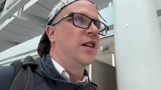 stupid 'world traveller' can't leave an airport, rages at his "just weird" viewers | cheap charlie