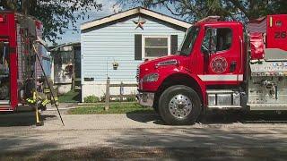 Crews battle trailer fire in Milan