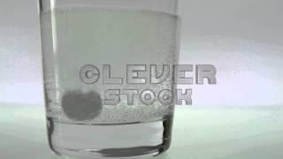 Aspirin Dissolving in Water - Stock Footage