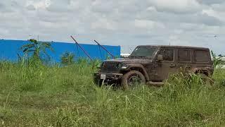 Jeep rubicon playing mud in cambodia