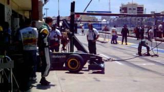 Team Lotus and Virgin F1 Cars Pix Exit in Valencia