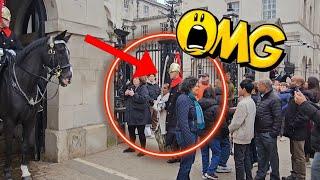 "OMG"! King's Guard bumps tourist out of the way!