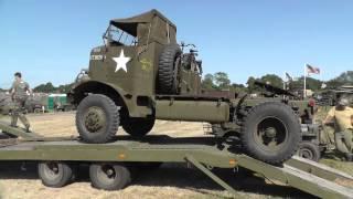 Federal 606 tank transporter unloading a Autocar U-7144T Tractor Unit