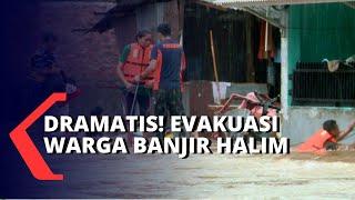 Dramatis! Petugas Evakuasi Warga yang Terjebak Banjir di Halim