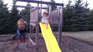 Conner falling off yellow slide