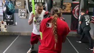 Jackie Garcia trains with pool noodles.