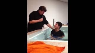Henry Flores get baptized