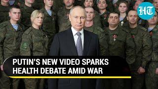 Putin’s shaking leg in new video sparks health concerns before war anniversary | Watch