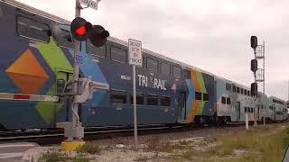 A Northbound Tri-Rail & A Southbound Amtrak Train At Boynton Beach 4-30-24