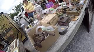 Selling and shopping at the fleamarket with Blue Bus Dave finding some treasures to buy