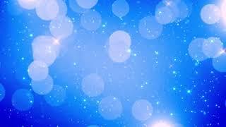 sparkling blue white glitter lights particles celebration background loop