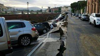 Road collapse plunges parked cars into Florence underwater pipe