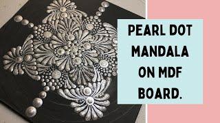 How to make a dot mandala painting with swooshes and swipes with pearl white colour.