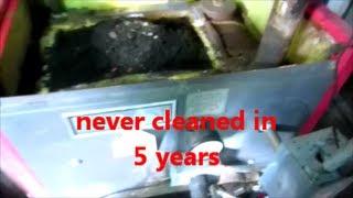 oil fired boiler  not cleaned in 5 years, full of soot,,,hard as concrete