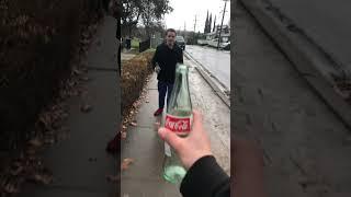 Smashing Glass Bottle On Head