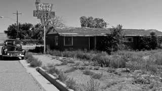 1947 Ford "Old Henry" visits old B&B Motel, Shoshoni, WY