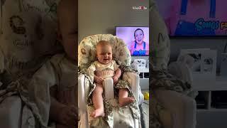 Baby smiles hearing the voice of Ms. Rachel