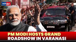 PM Modi holds grand roadshow in Varanasi, thousands on streets to get a glimpse