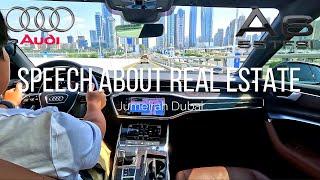 Audi A6 55 TFSI while driving talking about Real Estate in Dubai