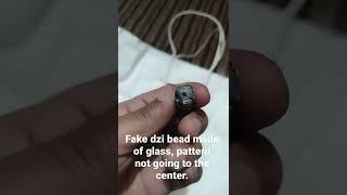 fake dzi bead made of glass. #fake#dzi#beads#ancient#agate#etched#tibetan#