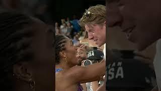 Tara Davis-Woodhall leaping into her husband's arms after winning the Gold medal in Long Jump