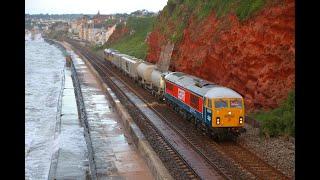 69004 top & tailed with 69003 pass at 05:39am on Dawlish on 3Q00 Weedkiller   03/06/23