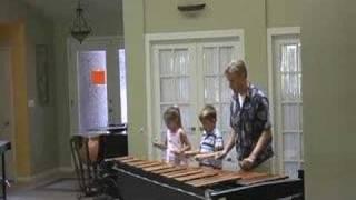 kids play marimba