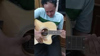Downsyndrome guy trying to play the guitar️