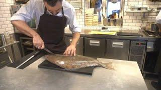 Big Halibut preparation at 1 Michelin star Gastromé in Aarhus, Denmark