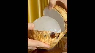 Satisfying fast cut of a “strange” coconut with relaxing, soothing sounds from the sharp knife