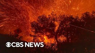 Live Coverage: At least 2 dead as wildfires rage around Los Angeles | CBS News