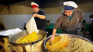 Samarkand pilaf in three big pots which was prepared with linseed oil