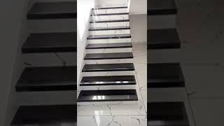 R black granite staircase with porcelain white tile riser | beautiful staircase #mydreamhouse