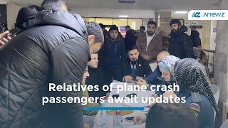 Relatives of plane crash passengers await updates