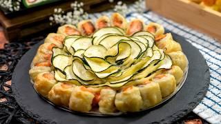 Puff pastry snacks. Salmon baked in puff pastry with zucchini, Baked Dipping Ring with Camembert