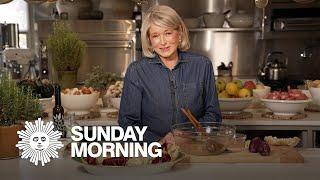 Martha Stewart prepares dishes from her 100th book