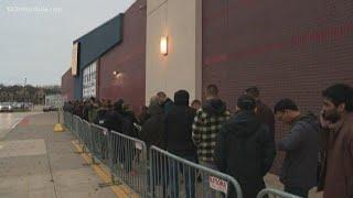 Black Friday shoppers line up for Best Buy deals on Thanksgiving Day