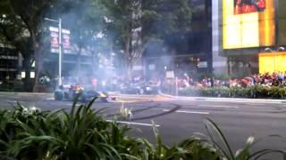 Red Bull Speed Street 2011 Singapore - RBR F1 Show Car Donuts and TAKES OFF!