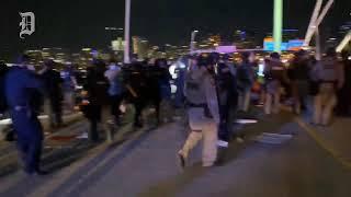 Dallas law enforcement arrest protesters on the Margaret Hunt Hill Bridge