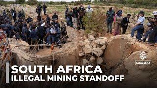 South Africa illegal mining standoff: Hundreds remain underground in disused gold mine